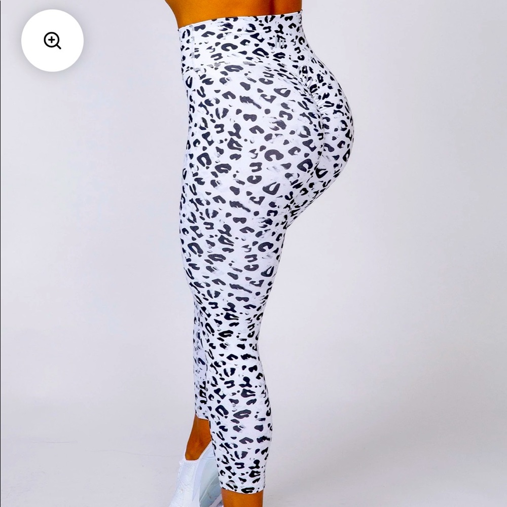 Muscle Nation Snow Leopard